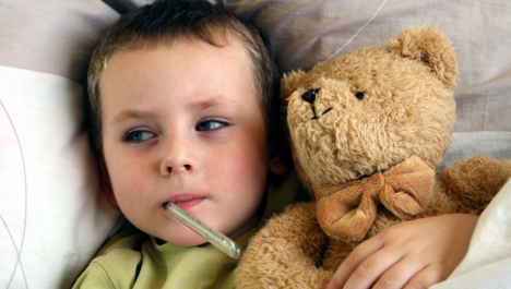 Child in hospital bed